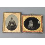 A black and white photograph of a seated dog 6cm oval, contained in a leather and gilt frame and 1