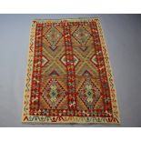 A green, turquoise and brown ground Chobi Kilim rug 183cm x 126cm