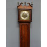 An 18th Century 8 day striking longcase clock, the 31cm brass dial with silvered chapter ring, Roman