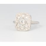 A platinum Edwardian style diamond ring approx. 0.6ct, 3.3 grams, size M 1/2