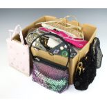 A collection of twenty four ladies evening bags together with 3 purses