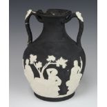 A Wedgwood and Bentley style Portland vase 23cm 1 handle is stuck in 3 places, the lip is chipped