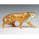 A Beswick figure of a leopard 1082, golden brown gloss, modelled by Arthur Greddington, 11.2cm