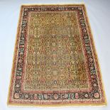 A machine made brown ground and floral patterned Persian style carpet 288cm h x 188cm Signs of