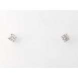 A pair of 18ct white gold brilliant cut diamond ear studs, approx. 0.5ct