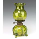 A 19th Century Continental green glass oil lamp with baluster base and flared neck shade 35cm The