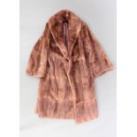 A lady's full length mink coat by John Dunn & Sons of Dorking (some moth)