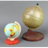 A Chad Valley pressed metal terrestrial globe 13cm together with 1 other 11cm Both globes have dents