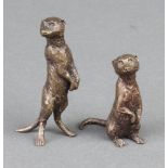 A 20th Century bronze figure of a standing Meerkat 5cm and 1 other 4cm