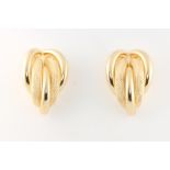 A pair of 18ct yellow gold scroll ear clips 5.6 grams