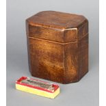 A M.Hohner vest pocket harp mouth organ and a mahogany lozenge shaped tea caddy 12cm h x 12cm w x