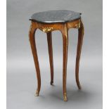 A French shaped walnut and gilt metal occasional table with green veined marble top, raised on
