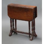 A Victorian mahogany drop flap Sutherland table, raised on turned supports 55cm h x 49cm w x 11cm