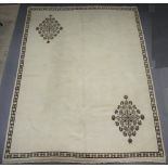 A white and black ground Moroccan berber carpet 391cm x 302cm Staining in places
