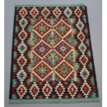 A white, green and turquoise ground Chobi Kilim rug with overall geometric design 146cm x 109cm