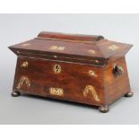 A Victorian inlaid mother of pearl tea caddy of sarcophagus form, fitted a glass mixing/sugar