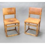 A pair of 17th Century style oak dining chairs, the seats and backs upholstered in leather and