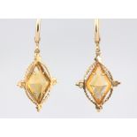 A pair of 9ct yellow gold citrine drop earrings gross weight 2.5 grams