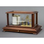 A 20th Century barograph contained in a mahogany case, the base fitted a drawer on bracket feet,