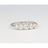 A platinum 5 stone graduated diamond ring, approx 0.70ct 2.7 grams, size N 1/2