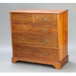 An Edwardian walnut chest of 2 short and 3 long drawers with brass escutcheons and gilt ring drop