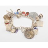 A silver charm bracelet 54 grams gross