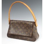 Louis Vuitton, a lady's handbag, the interior marked Louis Vuitton Paris, Made in France 15cm h x