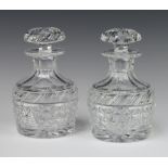 A pair of Georgian design mallet shaped decanters with mushroom stoppers 19cm