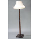 An Art Deco square mahogany standard lamp raised on a square stepped base 134cm h x 30cm Slight