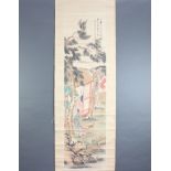 Chinese, early 20th Century hanging scroll, pen and wash depicting a gentleman and dog in a