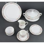 A Royal Albert Belinda pattern part tea and dinner service comprising 6 tea cups, 6 saucers, milk