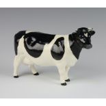 A Beswick figure - Friesian Cow CH. Claybury Leegwater no.1362A modelled by Arthur Greddington,