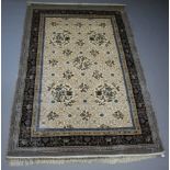 A grey and blue ground silk sculpted Chinese carpet 279cm x 183cm, the reverse with Harrods label