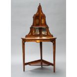 A Victorian inlaid rosewood 3 tier corner what-not, inlaid birds, raised on square tapered