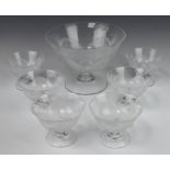 A moulded glass dessert service comprising pedestal fruit bowl and 6 pedestal bowls