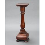 A Victorian square mahogany pedestal, raised on turned column with shaped base and bun feet 80cm h x