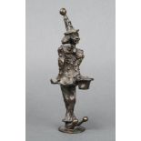 A bronze figure of a standing clown 17cm h x 3cm