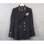 Burtons, a Royal Naval petty officer's tunic (1 cuff button torn) together with a Royal Naval Jaeger