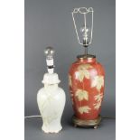A Chinese ceramic pedestal table lamp decorated with leaves 39cm, a ditto decorated bamboo 31cm