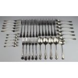 Five silver plated lily pattern dinner forks, 6 dessert spoons, 4 tablespoons, 5 teaspoons, 1 ladle,
