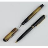 A tan marbled Platinum fountain pen together with a Mont Blanc ballpoint pen