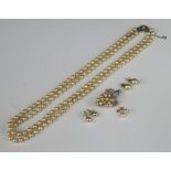 A quantity of imitation pearl jewellery