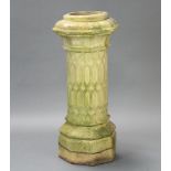 Doulton, a Victorian octagonal well weathered chimney pot with tracery decoration to the body