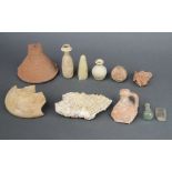 A collection of Roman and later shards of pottery etc