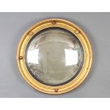 A Georgian style circular convex plate wall mirror, contained in a gilt ball studded frame 46cm