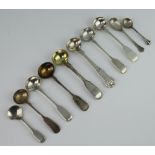 A Victorian silver mustard spoon London 1865 and 9 other mixed spoons, 123 grams