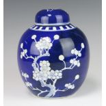 A blue and white prunus ginger jar and cover with double ring mark base 20cm