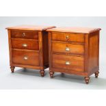 A pair of Philadelphia style mahogany bedside chests of 3 drawers with fluted columns to the side,