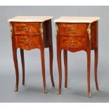 A pair of French style Kingwood finished bedside chests with pink veined marble tops, fitted 2 short