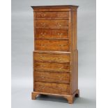 A Georgian style bleached mahogany chest on chest with moulded and dentil cornice, the upper section